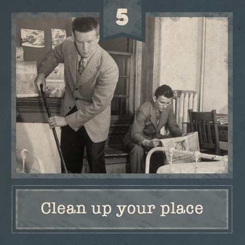 Men cleaning apartment sweeping vacuuming.