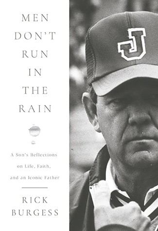 Black-and-white book cover showing a serious older man in a cap with a "J" on it; text reads "Men Don't Run in the Rain" by Rick Burgess, exploring being a man and sharing old-school lessons.