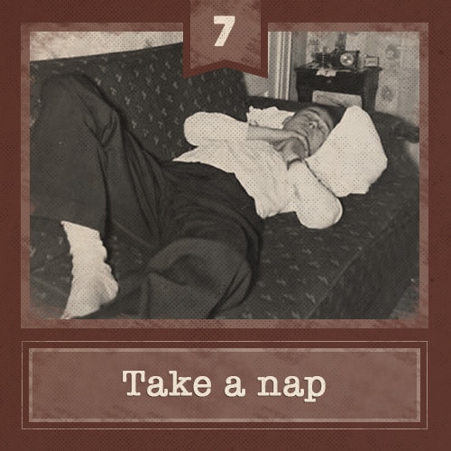 Vintage man napping on couch.