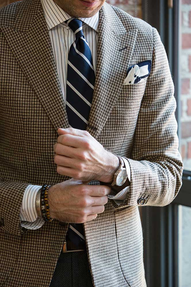 Brown-toned houndstooth blazer from He Spoke Style.