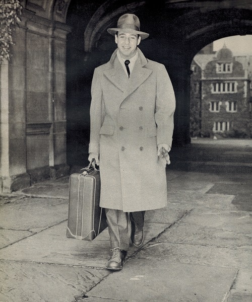 Vintage college student wearing polo overcoat. 