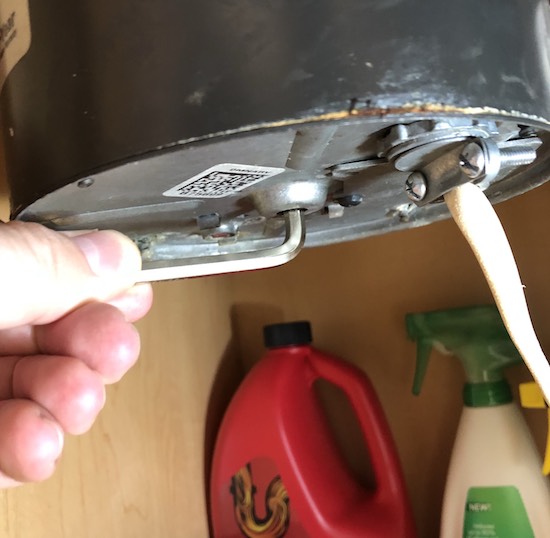 Operating the manual crank.