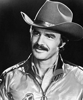 Burt Reynolds mustache Burt Reynolds wearing cowboy hat showing mustache.